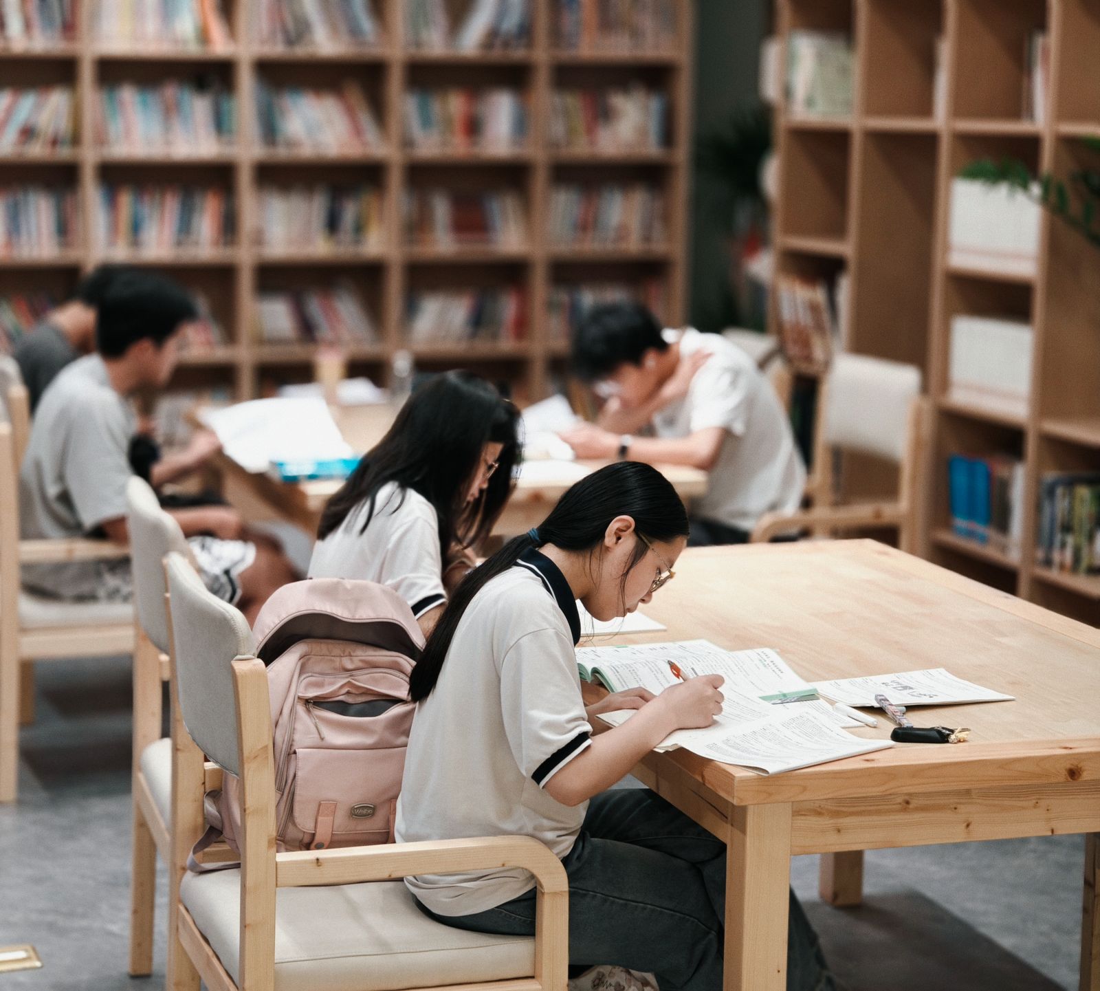 Illustrative photograph of students studying in a library